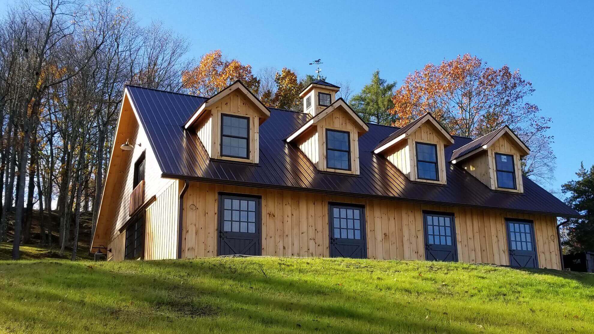 Cedar and Metal Roof Stable Exterior by Old Town Barns