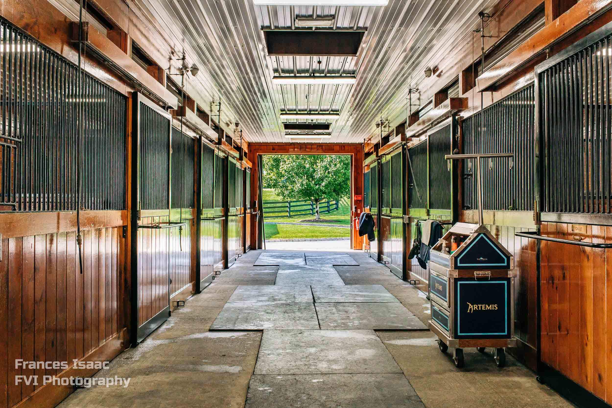 A Barn View through the Custom Horse Stable by Old Town Barns