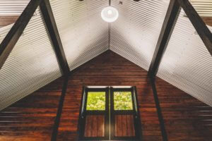 A look up in the interior of a custom built horse barn