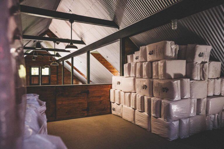Hay stacked up in the loft of Horse Stable