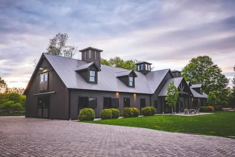 Outside of a custom horse barn built by Old Town Barns