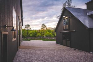 A look through the courtyard between the Horse Stable and Riding Arena