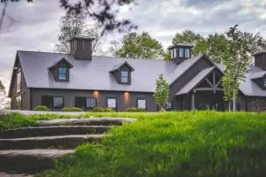 Horse Stalls with windows open in a custom built horse barn by Old Town Barns