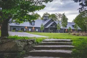 Medium Horse Barn Lit up as Night approaches